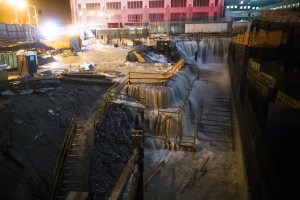 Floodwaters inundate Ground Zero construction site in NYC (via AP)